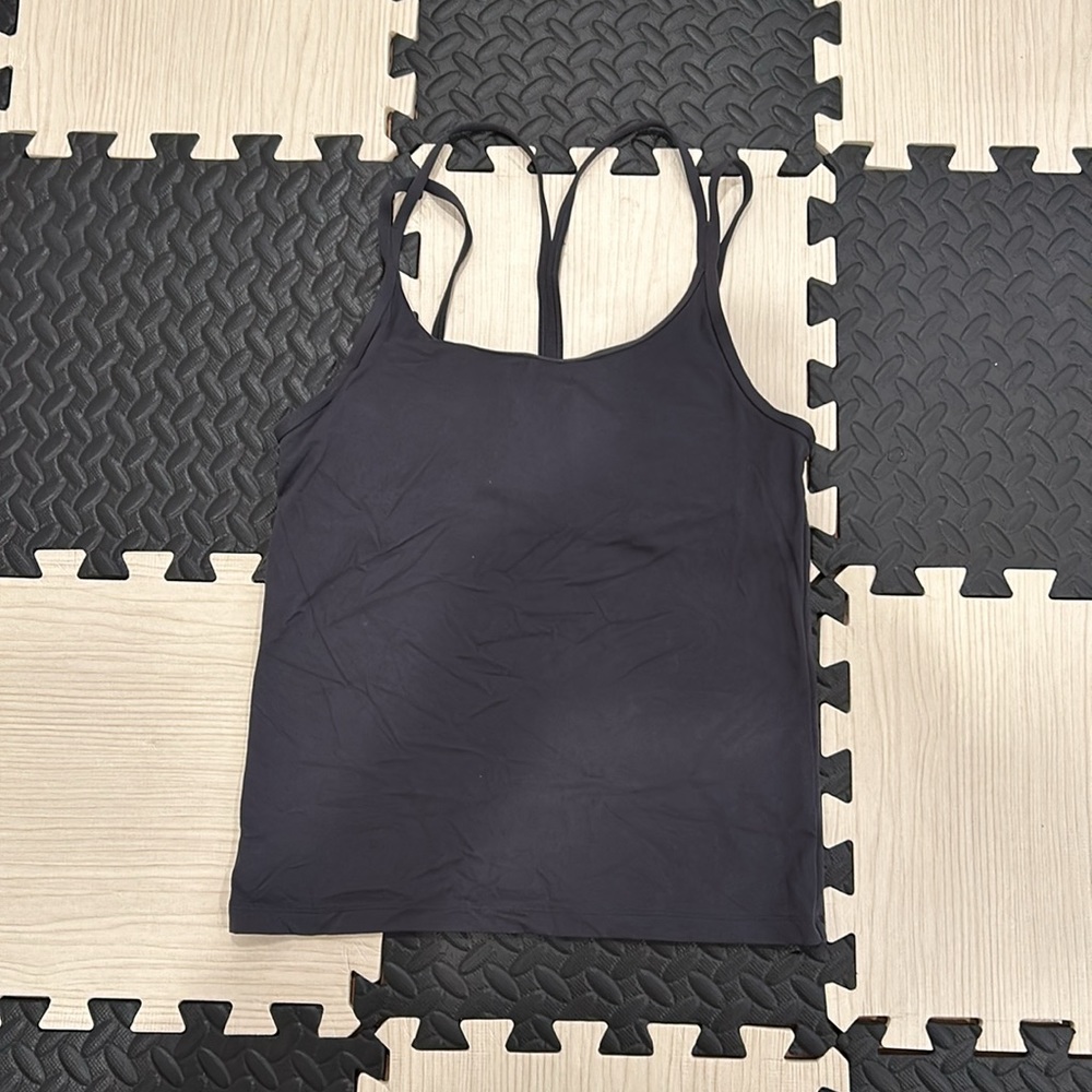 Pink Victoria’s Secret gray workout top in size medium